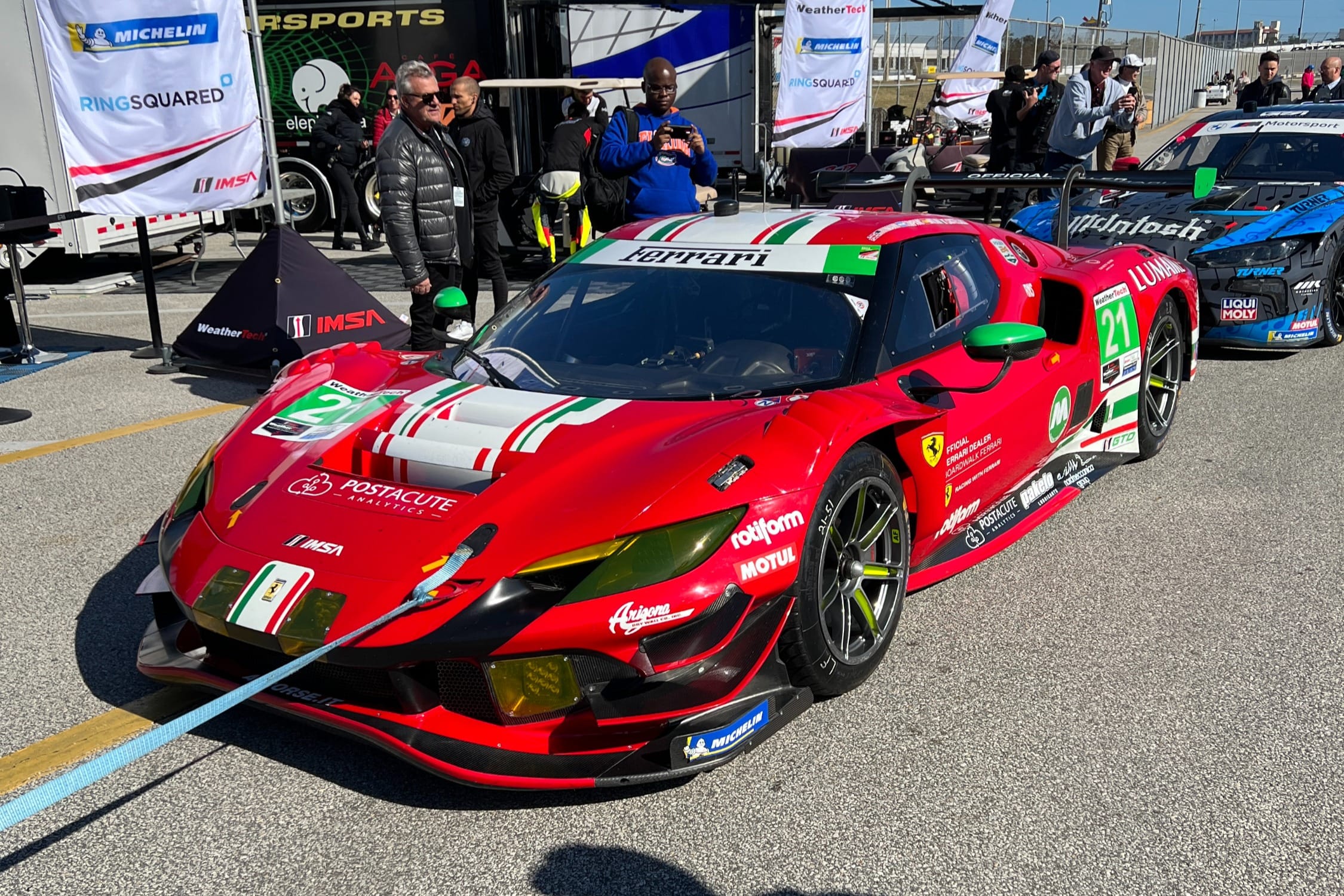 Ferrari 296 GT3 in Italian tricolour livery in the Daytona paddock ahead of the 24 Hours race