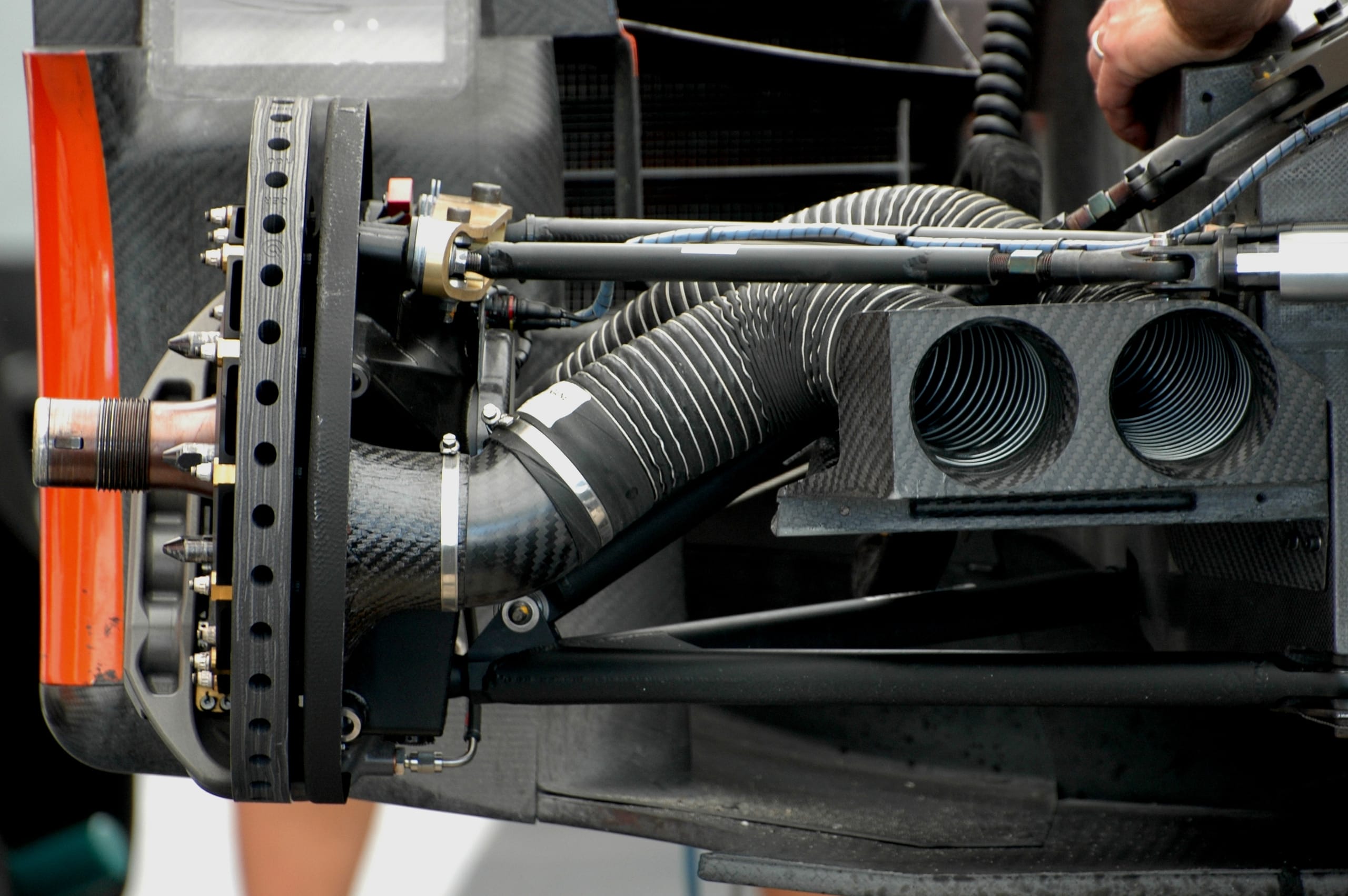 Figure 2: Brake cooling duct routed from the disassembled front of a Le Mans prototype race car to the front brake rotor assembly