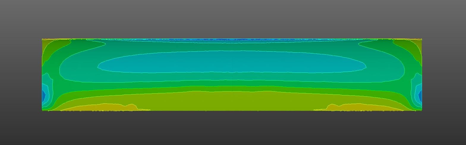 CFD screenshot showing the low-pressure surface of an aerofoil, with colour gradient indicating pressure increasing along the chord towards the trailing edge