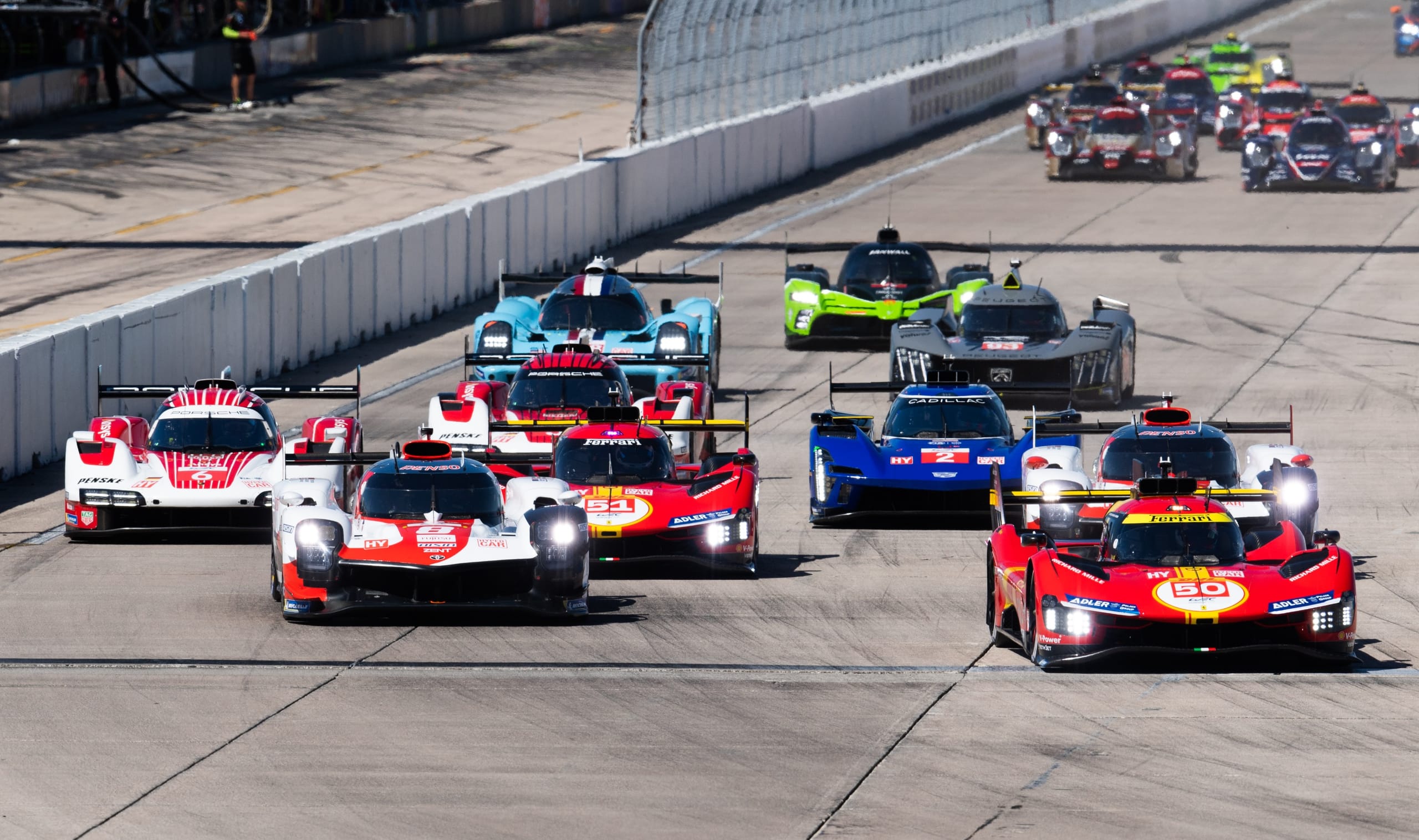 LMH & LMDh cars at Sebring turn 1
