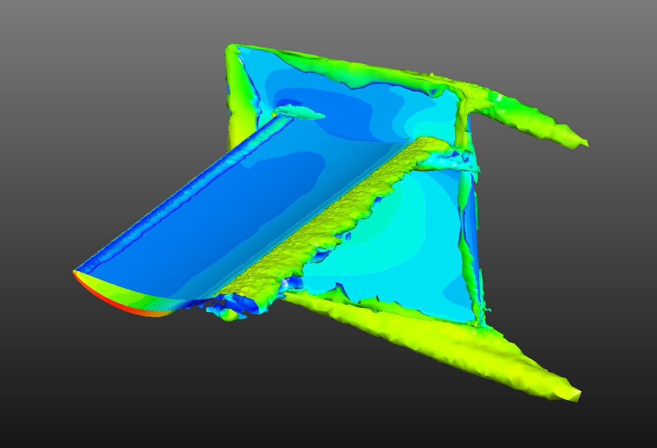 Figure 11: CFD showing reduced HP endplate height allowing flow to bleed over the top surface and reduce drag on V3