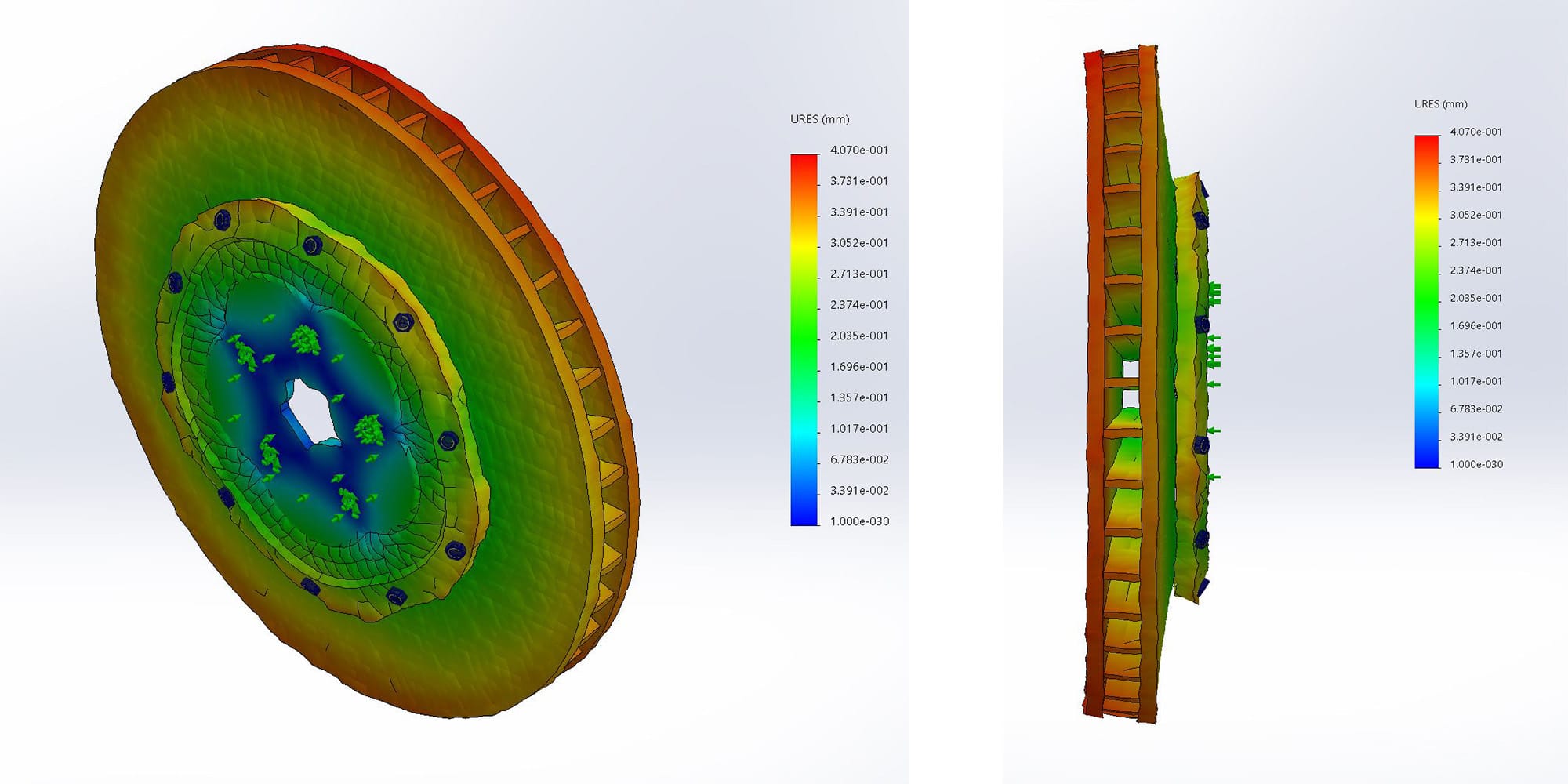 FEA deformation plot of the 2-piece disc at 100x scale showing anisotropic expansion and conical rotor distortion
