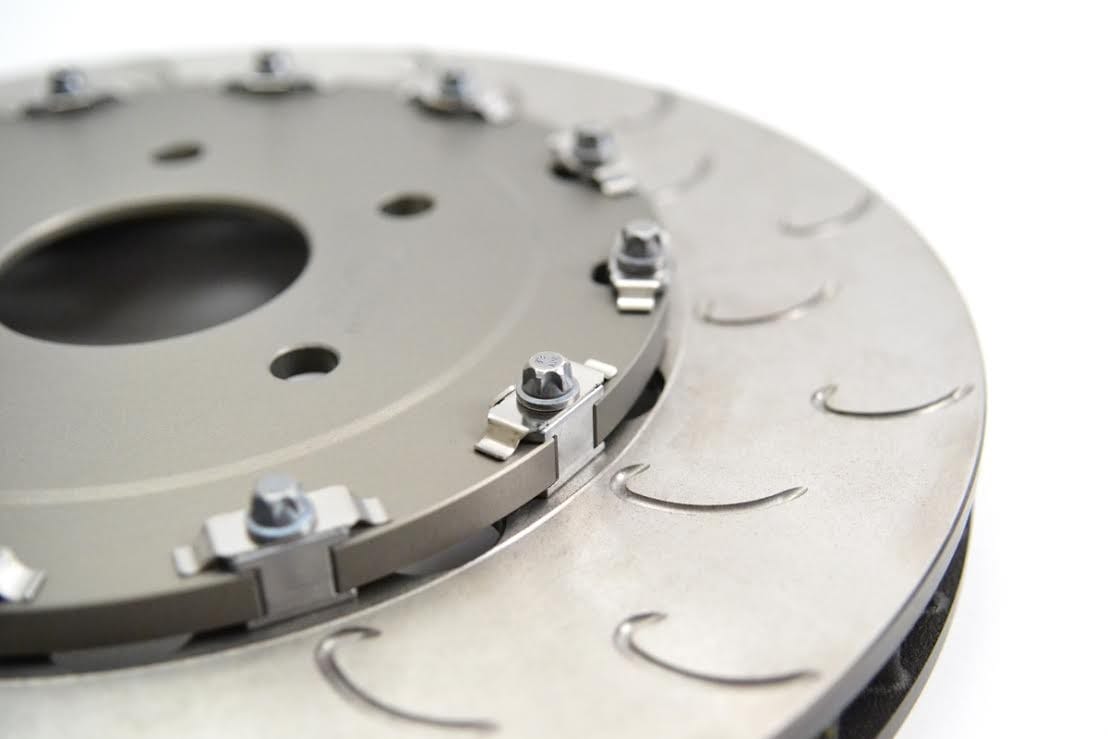 Close-up of floating disc bobbins constraining the rotor to the bell while allowing relative thermal expansion movement