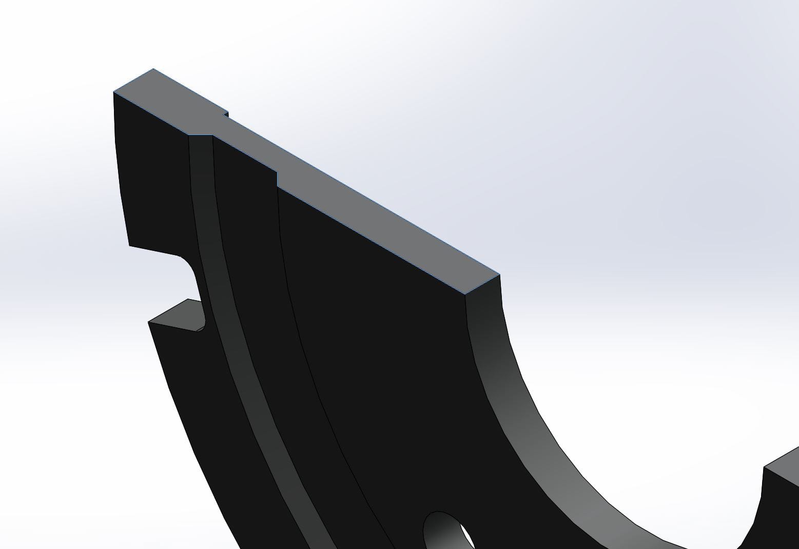 Profile of the floating disc mounting bell geometry showing its asymmetric form that contributes to non-uniform thermal expansion