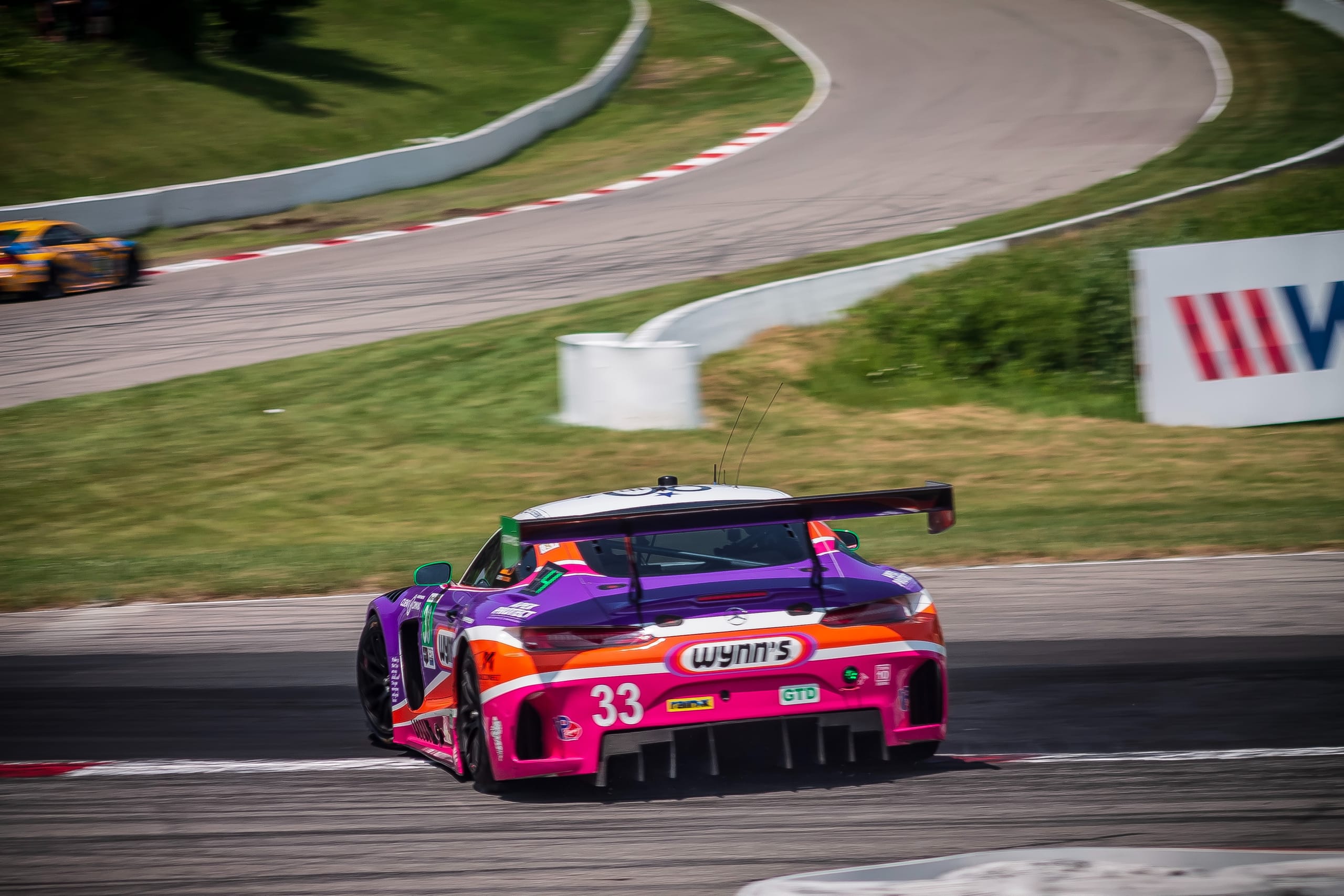 Race car showing an oversteer chassis balance that worsens progressively as the rear tyres wear